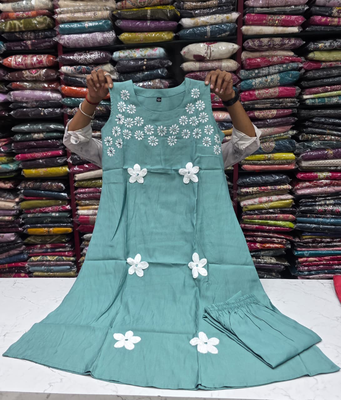 Women's Sea Green Floral Embroidered A-Line Kurti with Pant Set | Sleeveless Round Neck Ethnic Wear