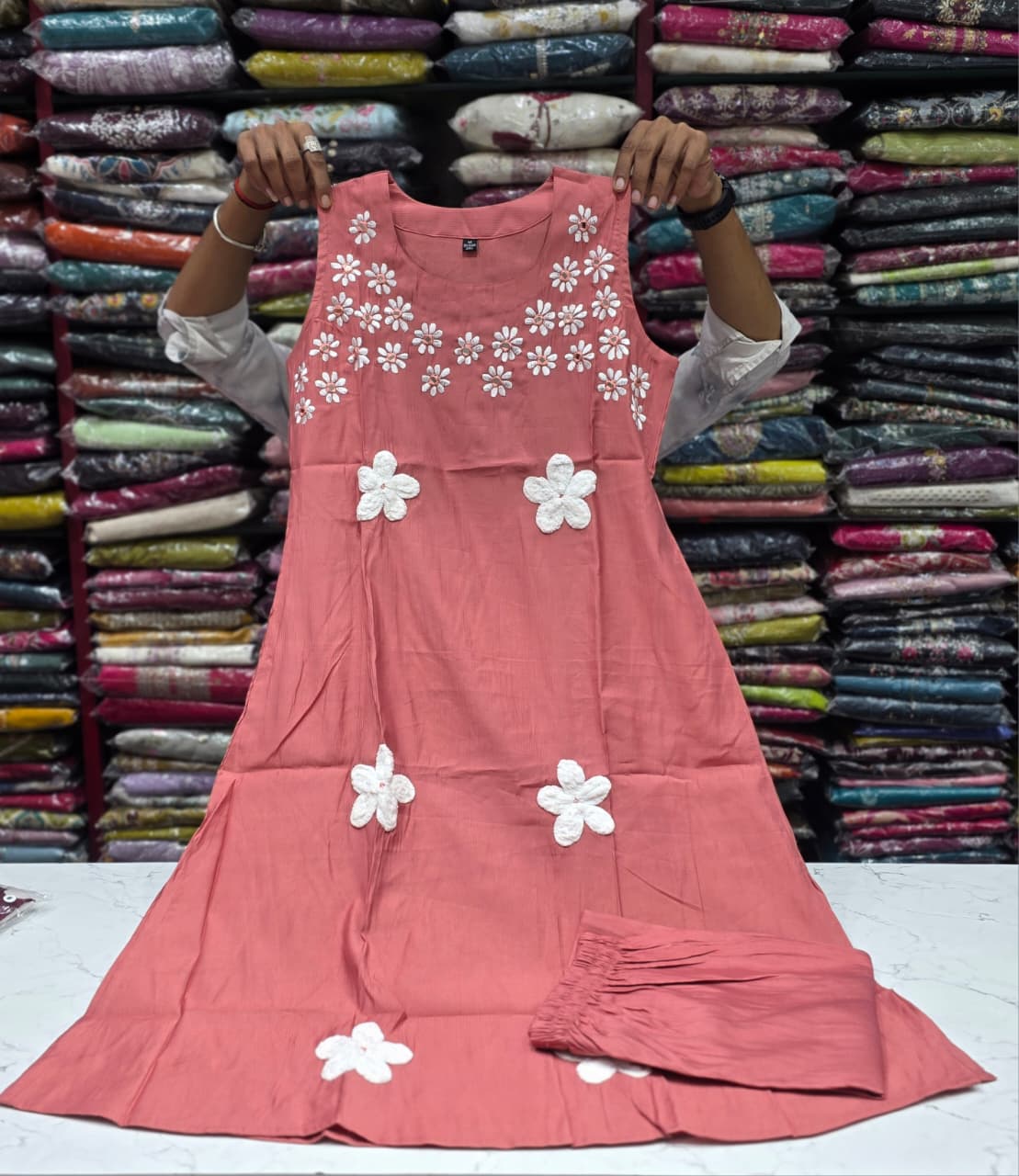 Women's Peach Floral Embroidered A-Line Kurti with Pant Set | Sleeveless Round Neck Ethnic Wear