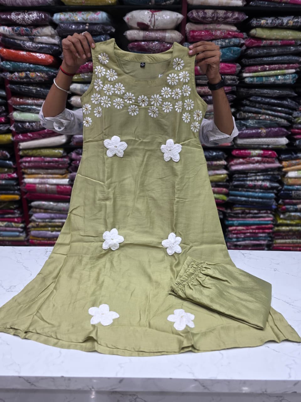 Women's Olive Green Floral Embroidered A-Line Kurti with Pant Set | Sleeveless Round Neck Ethnic Wear